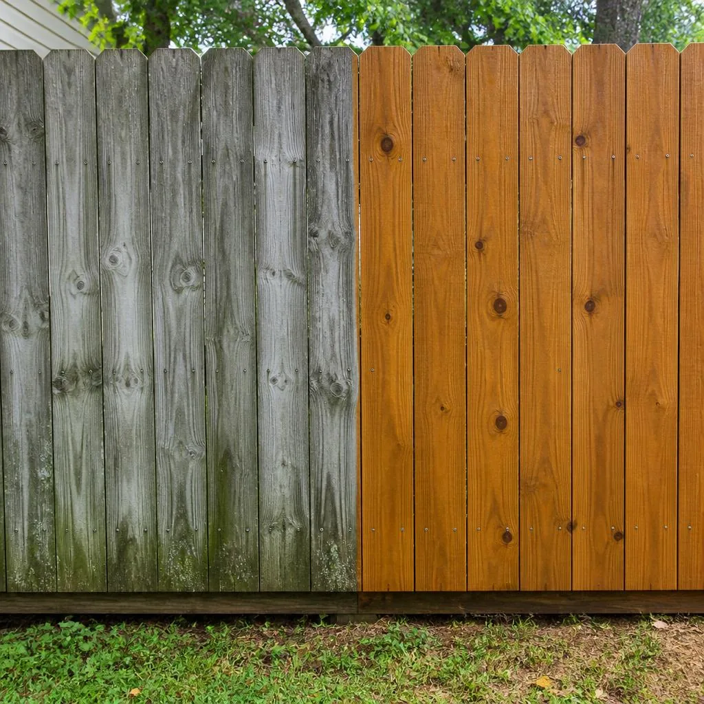 Wood fence before and after cleaning